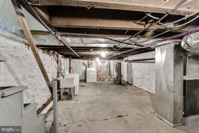 3339 N 21st St, Philadelphia, PA 19140 - unfinished basement featuring separate washer and dryer and gas water heater