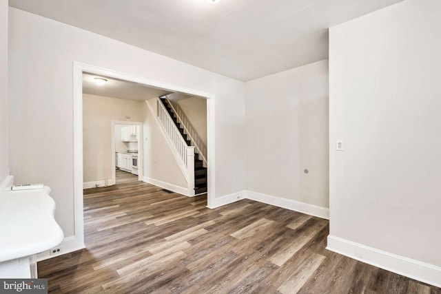 3339 N 21st St, Philadelphia, PA 19140 - unfurnished room featuring wood finished floors and stairs