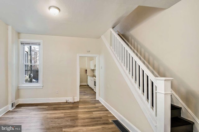 3339 N 21st St, Philadelphia, PA 19140 - stairway with wood finished floors and baseboards