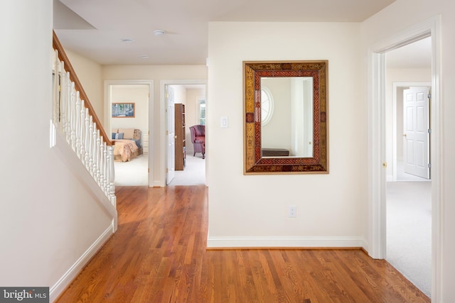 211 Twinings Ln, Wayne, PA 19087 - corridor featuring wood finished floors and stairway