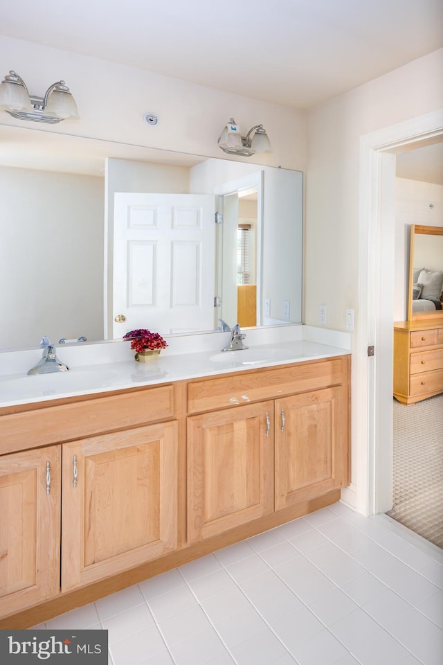 211 Twinings Ln, Wayne, PA 19087 - ensuite bathroom with double vanity and tile patterned flooring