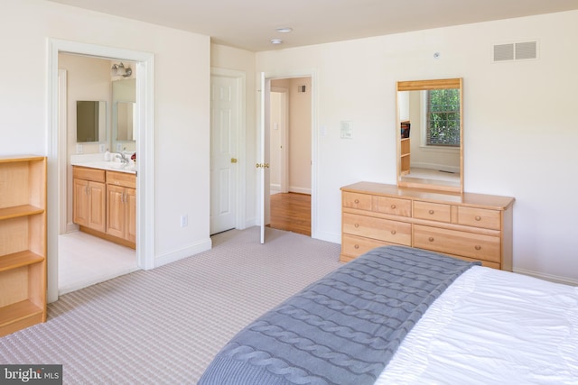 211 Twinings Ln, Wayne, PA 19087 - bedroom with light colored carpet and ensuite bath