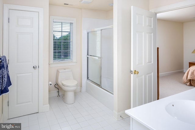211 Twinings Ln, Wayne, PA 19087 - bathroom featuring shower / bath combination with glass door, vanity, and tile patterned floors