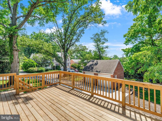 10109 Lorain Ave, Silver Spring, MD 20901 - wooden deck featuring an outbuilding