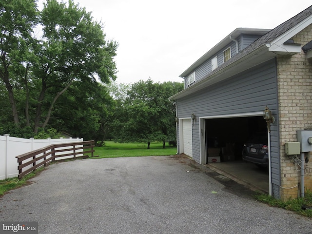 13937 Alderton Rd, Silver Spring, MD 20906 - garage with asphalt driveway