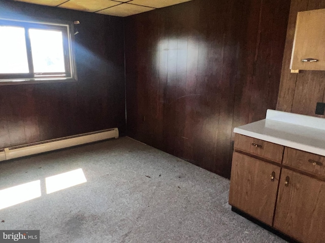 733 Saint Paul Rd, Meyersdale, PA 15552 - carpeted empty room with wooden walls and baseboard heating