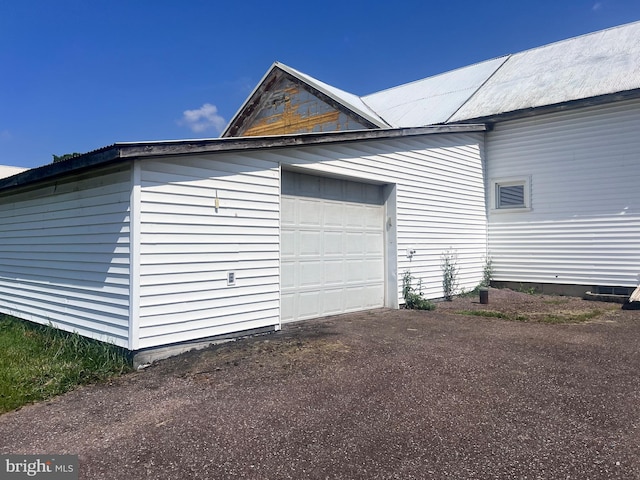 733 Saint Paul Rd, Meyersdale, PA 15552 - garage featuring asphalt driveway