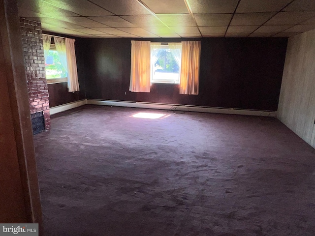 733 Saint Paul Rd, Meyersdale, PA 15552 - empty room featuring dark colored carpet, healthy amount of natural light, a drop ceiling, and baseboard heating
