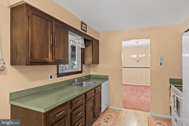 269 Burning Tree Rd, Delran, NJ 08075 - kitchen featuring white appliances, dark brown cabinets, light carpet, a chandelier, and pendant lighting