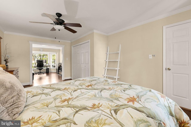 8327 Fran Ct, Lorton, VA 22079 - bedroom with wood finished floors, a closet, crown molding, a ceiling fan, and a desk