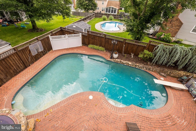 8327 Fran Ct, Lorton, VA 22079 - view of pool with a fenced backyard and a diving board