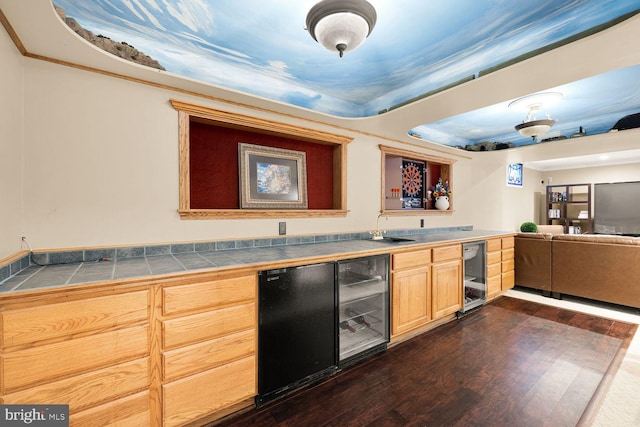 8327 Fran Ct, Lorton, VA 22079 - indoor wet bar with beverage cooler, dark wood-style flooring, freestanding refrigerator, and ornamental molding