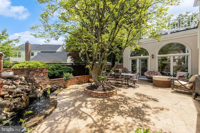 8327 Fran Ct, Lorton, VA 22079 - view of patio featuring french doors and an outdoor living space