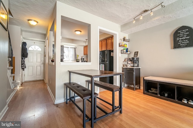 689 Colony Dr, York, PA 17404 - foyer featuring a textured ceiling and light wood-style floors