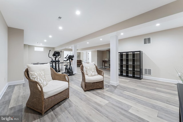 12801 Owlsley Way, Herndon, VA 20171 - living area featuring recessed lighting, light wood-style floors, and decorative columns