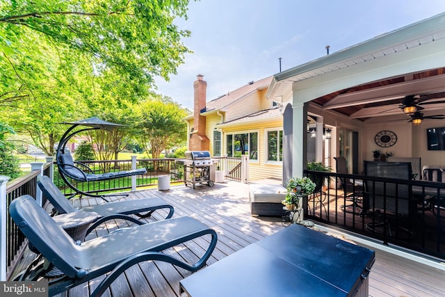 12801 Owlsley Way, Herndon, VA 20171 - wooden deck with area for grilling and a ceiling fan