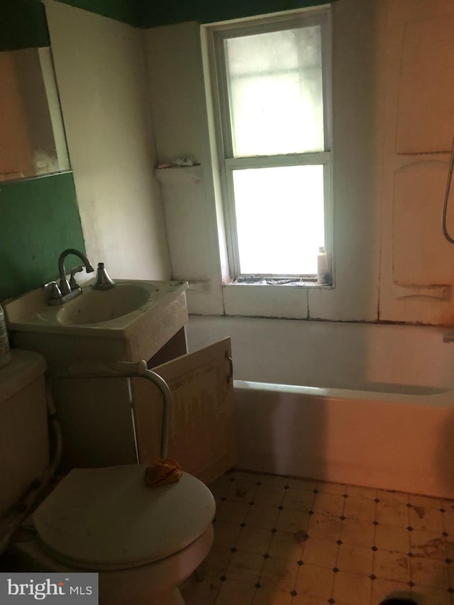 1730 Mckean Ave, Baltimore, MD 21217 - bathroom featuring toilet and washtub / shower combination