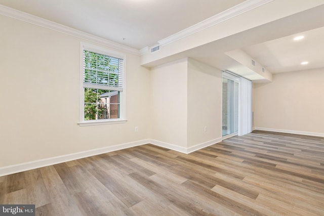 826 Quince Orchard Blvd Unit 101, Gaithersburg, MD 20878 - unfurnished room featuring crown molding, wood finished floors, and recessed lighting