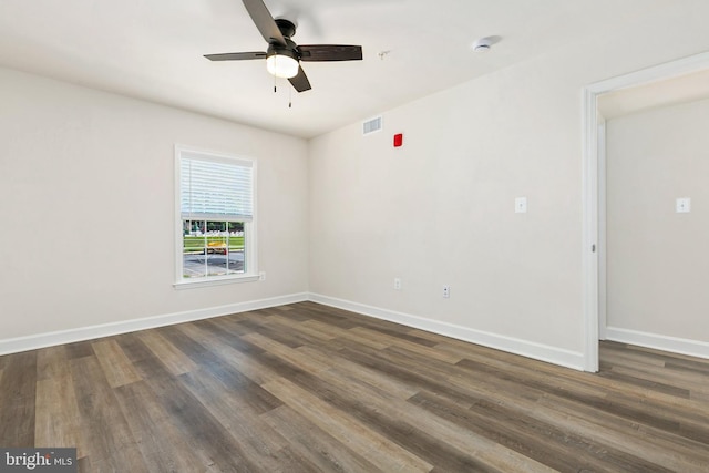 826 Quince Orchard Blvd Unit 101, Gaithersburg, MD 20878 - unfurnished room with ceiling fan, dark wood finished floors, and a smoke detector