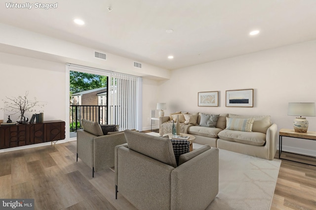 826 Quince Orchard Blvd Unit 101, Gaithersburg, MD 20878 - living area with wood finished floors and recessed lighting