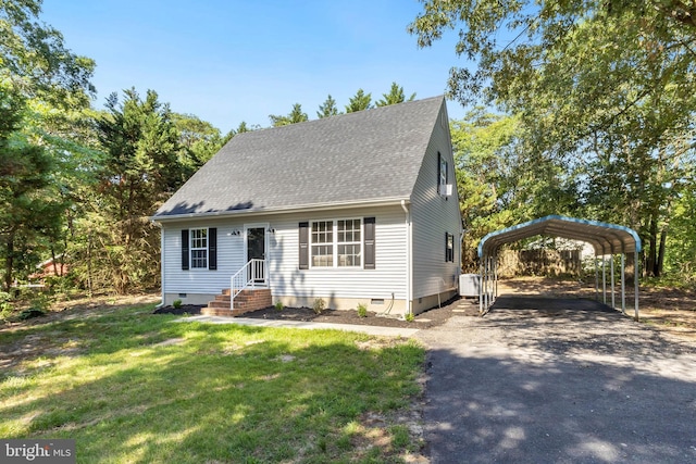 6508 Millcreek Rd, Laurel, DE 19956 - new england style home featuring crawl space, driveway, a carport, a front yard, and roof with shingles