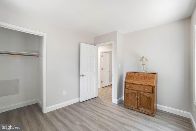 6508 Millcreek Rd, Laurel, DE 19956 - bedroom with light wood-style floors and a closet