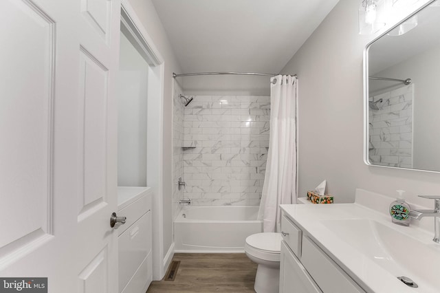 6508 Millcreek Rd, Laurel, DE 19956 - full bathroom featuring vanity, shower / bath combo, and wood finished floors
