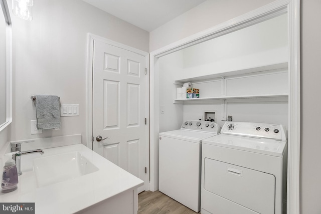 6508 Millcreek Rd, Laurel, DE 19956 - laundry area featuring independent washer and dryer and light wood-type flooring