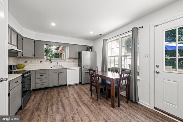 20 Woodvale Dr, Atco, NJ 08004 - kitchen with appliances with stainless steel finishes, gray cabinets, under cabinet range hood, dark wood-style flooring, and recessed lighting