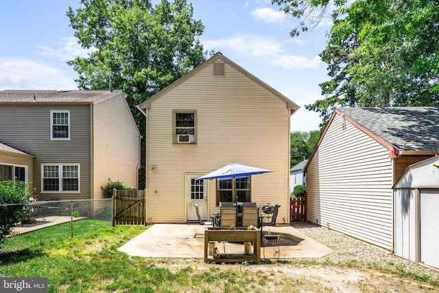 20 Woodvale Dr, Atco, NJ 08004 - back of property with a patio, a gate, and a fenced backyard