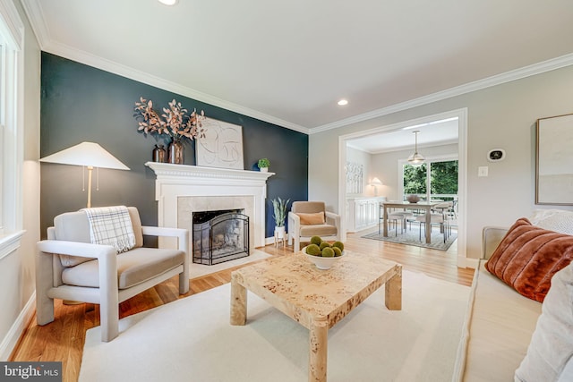 1930 Foxhall Rd, Mclean, VA 22101 - living area featuring wood finished floors, crown molding, recessed lighting, and a tiled fireplace