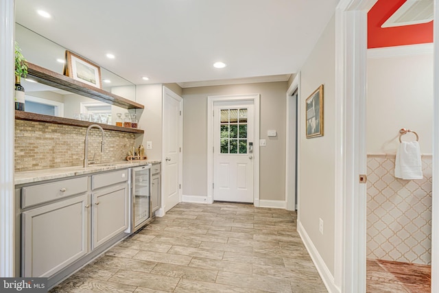1930 Foxhall Rd, Mclean, VA 22101 - kitchen with beverage cooler, open shelves, light stone countertops, recessed lighting, and decorative backsplash