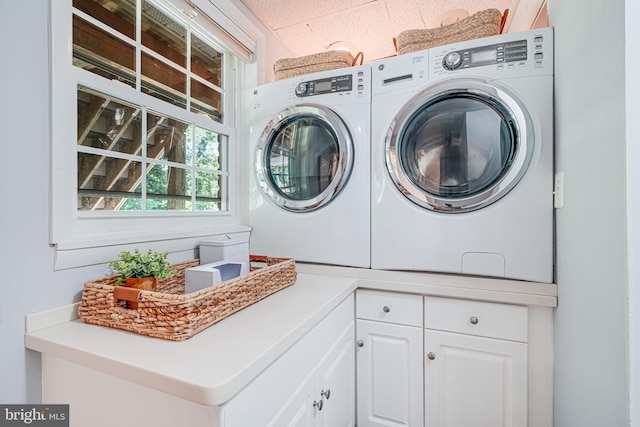 1930 Foxhall Rd, Mclean, VA 22101 - washroom featuring cabinet space and washer and clothes dryer