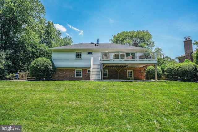 1930 Foxhall Rd, Mclean, VA 22101 - back of house with a deck, brick siding, and a yard
