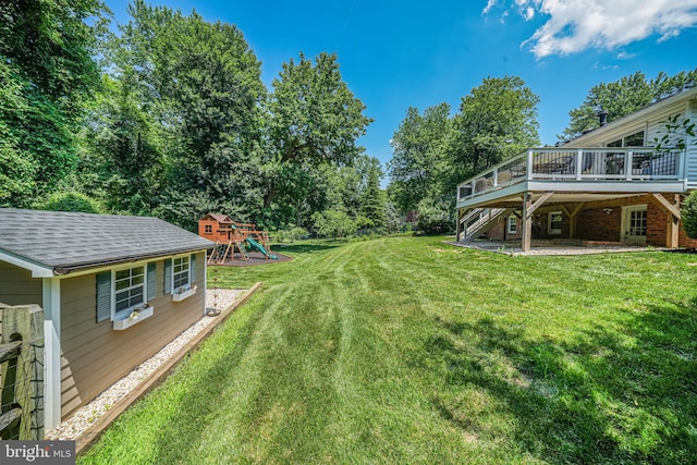 1930 Foxhall Rd, Mclean, VA 22101 - view of grassy yard with a deck, stairway, and a playground