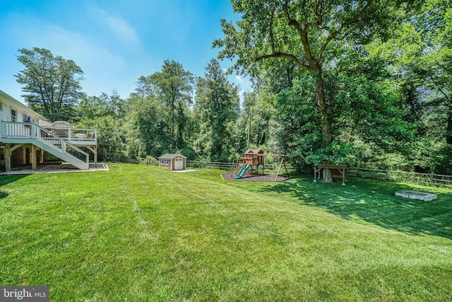 1930 Foxhall Rd, Mclean, VA 22101 - fenced backyard featuring a shed, stairs, a deck, and a playground