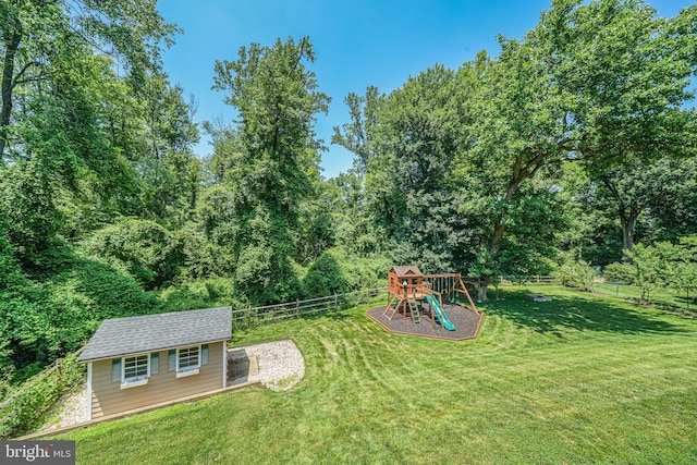 1930 Foxhall Rd, Mclean, VA 22101 - fenced backyard featuring a playground and an outdoor structure