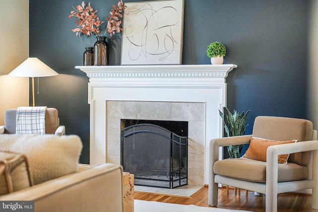 1930 Foxhall Rd, Mclean, VA 22101 - living room featuring a tiled fireplace and wood finished floors