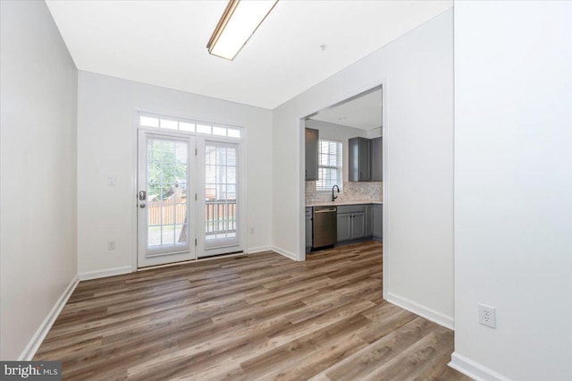 1806 Wheyfield Dr, Frederick, MD 21701 - unfurnished dining area featuring light wood finished floors and baseboards