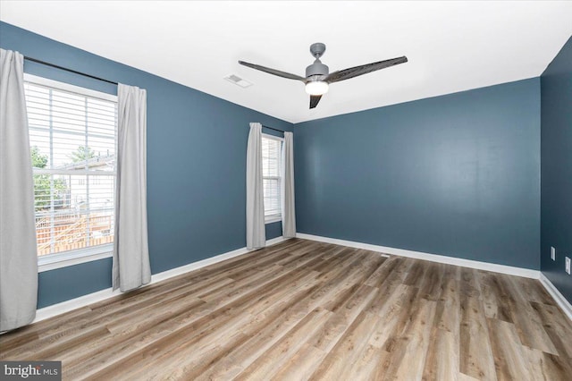 1806 Wheyfield Dr, Frederick, MD 21701 - unfurnished room featuring healthy amount of natural light, wood finished floors, and ceiling fan