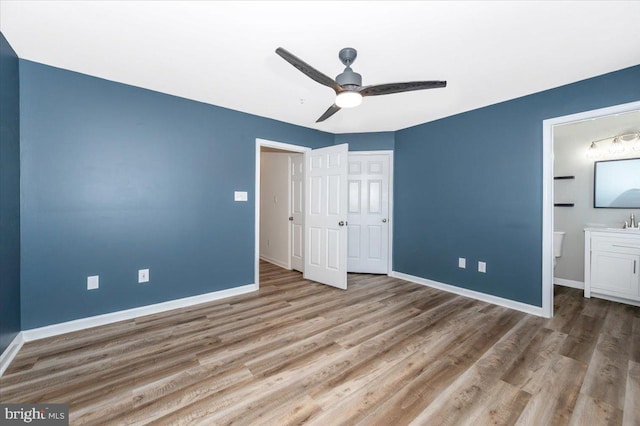 1806 Wheyfield Dr, Frederick, MD 21701 - unfurnished bedroom with wood finished floors, ensuite bath, ceiling fan, and a closet