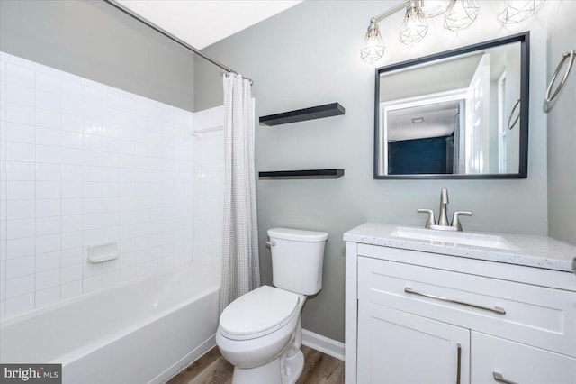 1806 Wheyfield Dr, Frederick, MD 21701 - full bathroom featuring wood finished floors, vanity, and shower / tub combo with curtain