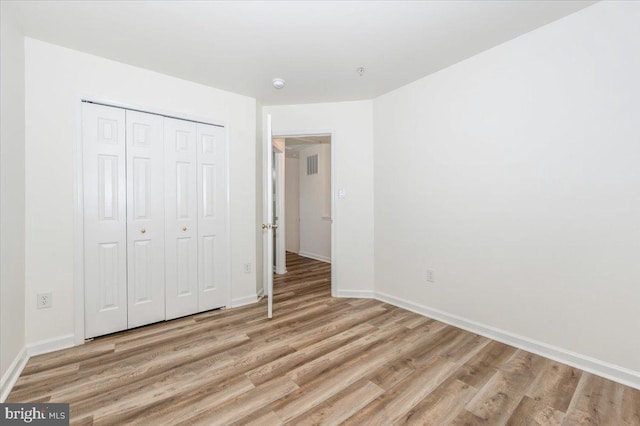 1806 Wheyfield Dr, Frederick, MD 21701 - unfurnished bedroom with light wood-type flooring and a closet
