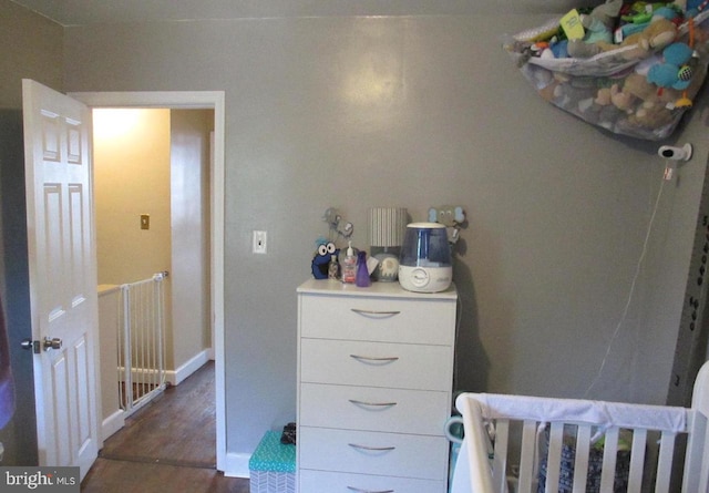 3642 Clarenell Rd, Baltimore, MD 21229 - bedroom featuring dark wood-type flooring and baseboards