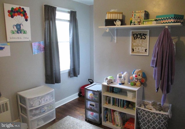 3642 Clarenell Rd, Baltimore, MD 21229 - game room with wood finished floors and baseboards