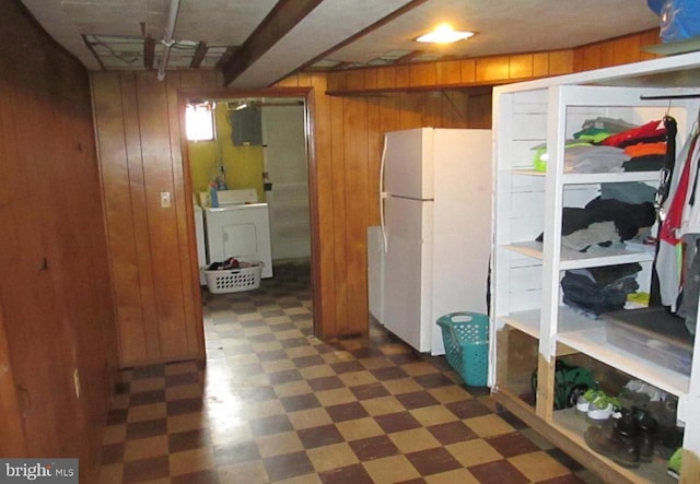 3642 Clarenell Rd, Baltimore, MD 21229 - finished basement featuring freestanding refrigerator, tile patterned floors, washer / dryer, and wooden walls