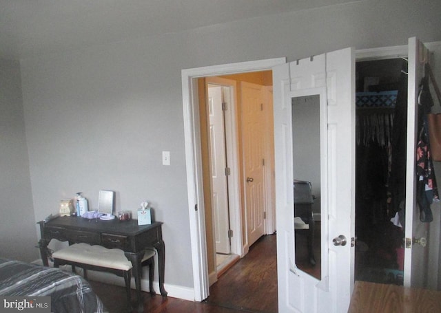 3642 Clarenell Rd, Baltimore, MD 21229 - bedroom with dark wood-style flooring and baseboards