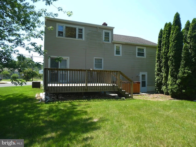 2 Pineview, Berlin, NJ 08009 - rear view of property with a wooden deck, a yard, and a chimney