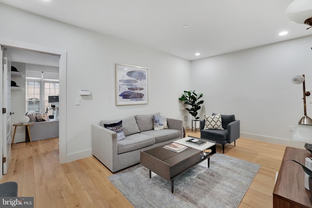 1309 SE E St SE Unit 27, Washington, DC 20003 - living area featuring light wood finished floors and recessed lighting