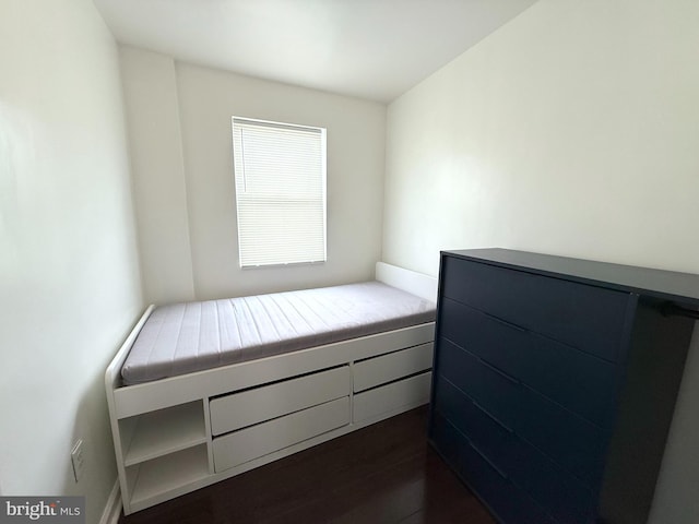 1611 S 28th St, Philadelphia, PA 19145 - unfurnished bedroom featuring dark wood-style floors